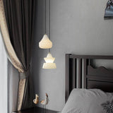 Alabaster Hat Pendant Light Over Nightstand - thebelacan